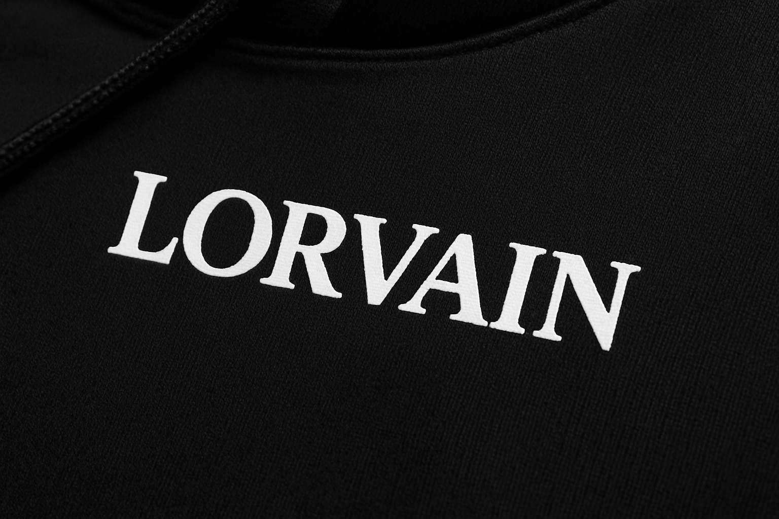 Black LORVAIN hoodie fabric and text close-up